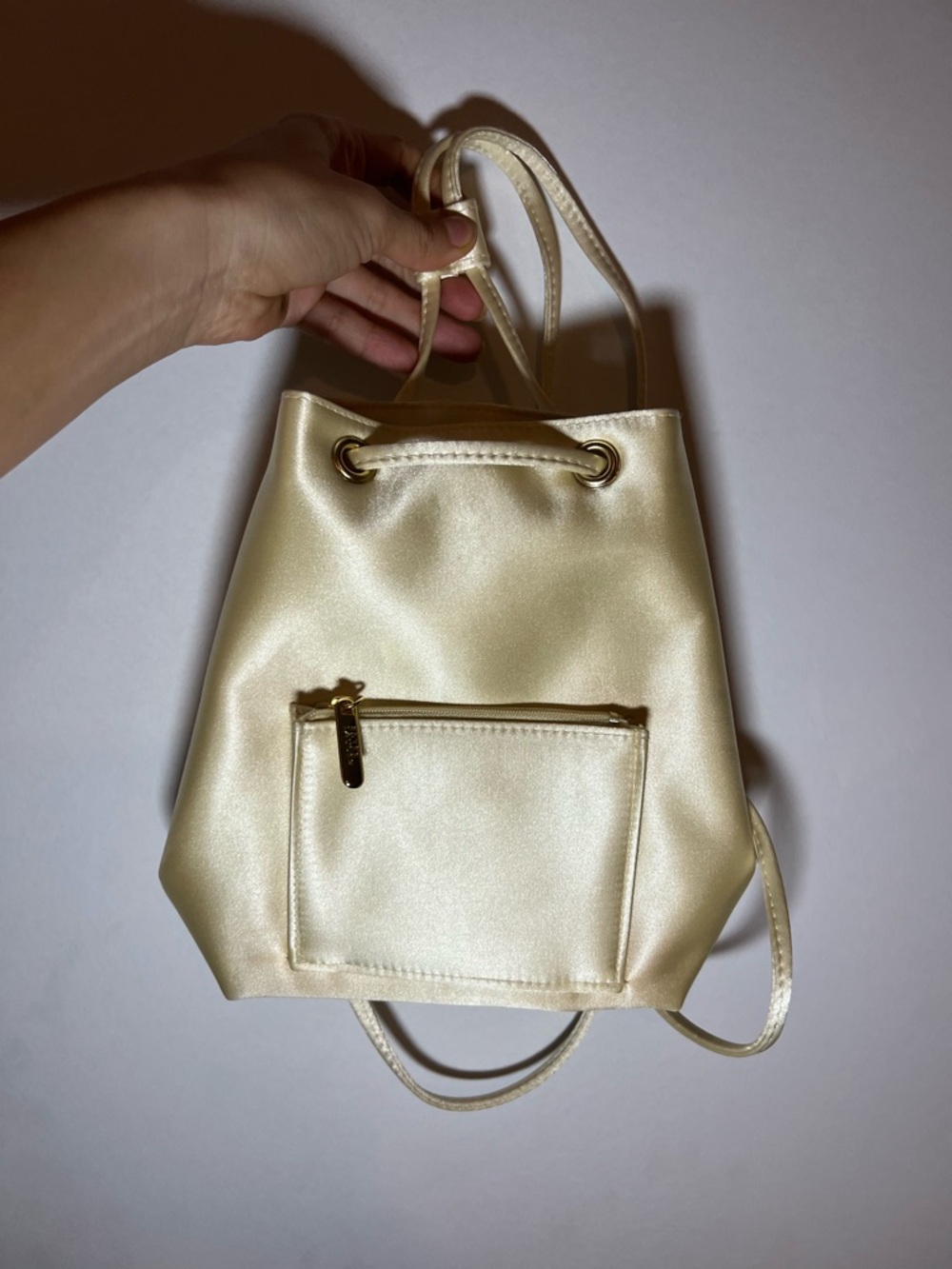 Estee Lauder Satin Ivory Drawstring Backpack
